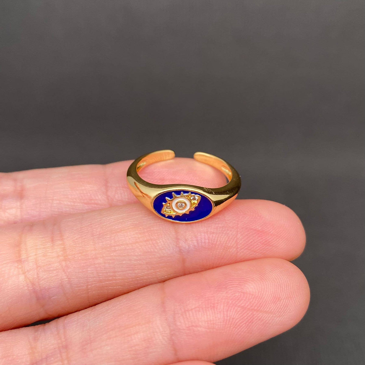 Rhinestone Inlaid Enamel Eyes Golden Ring