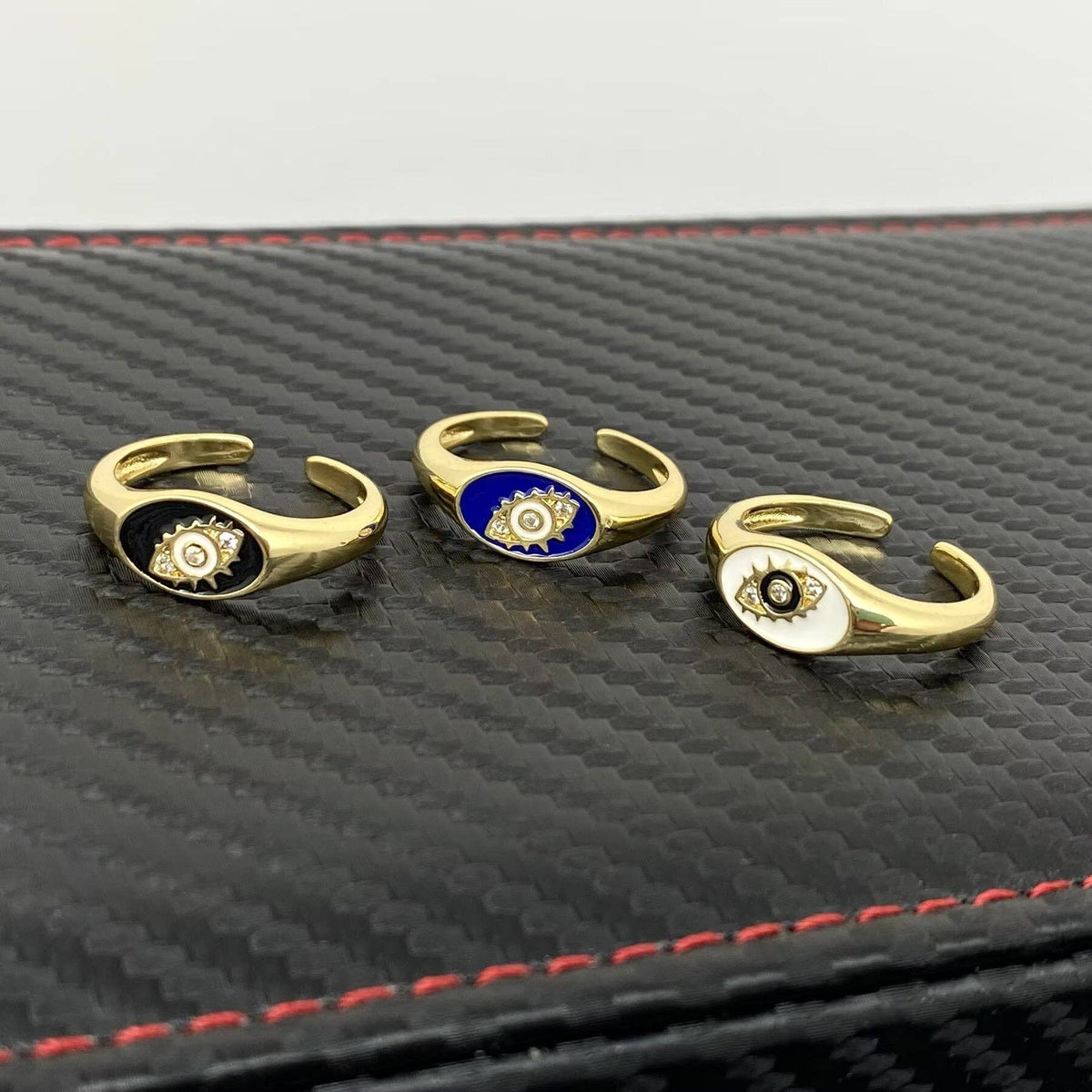 Rhinestone Inlaid Enamel Eyes Golden Ring