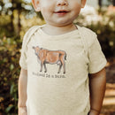 "Raised in A Barn" Cow Onesie