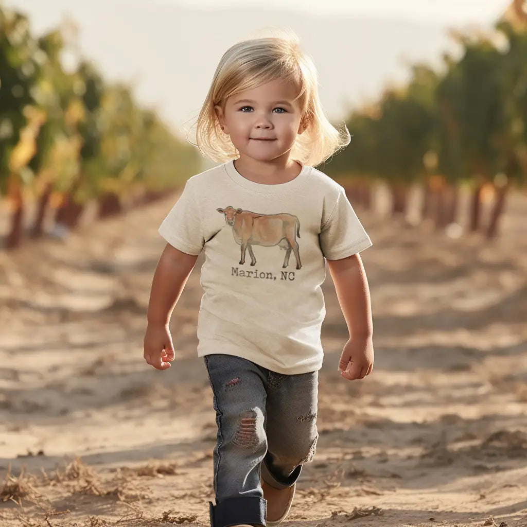 Raised in A Barn Cow Kid Tee