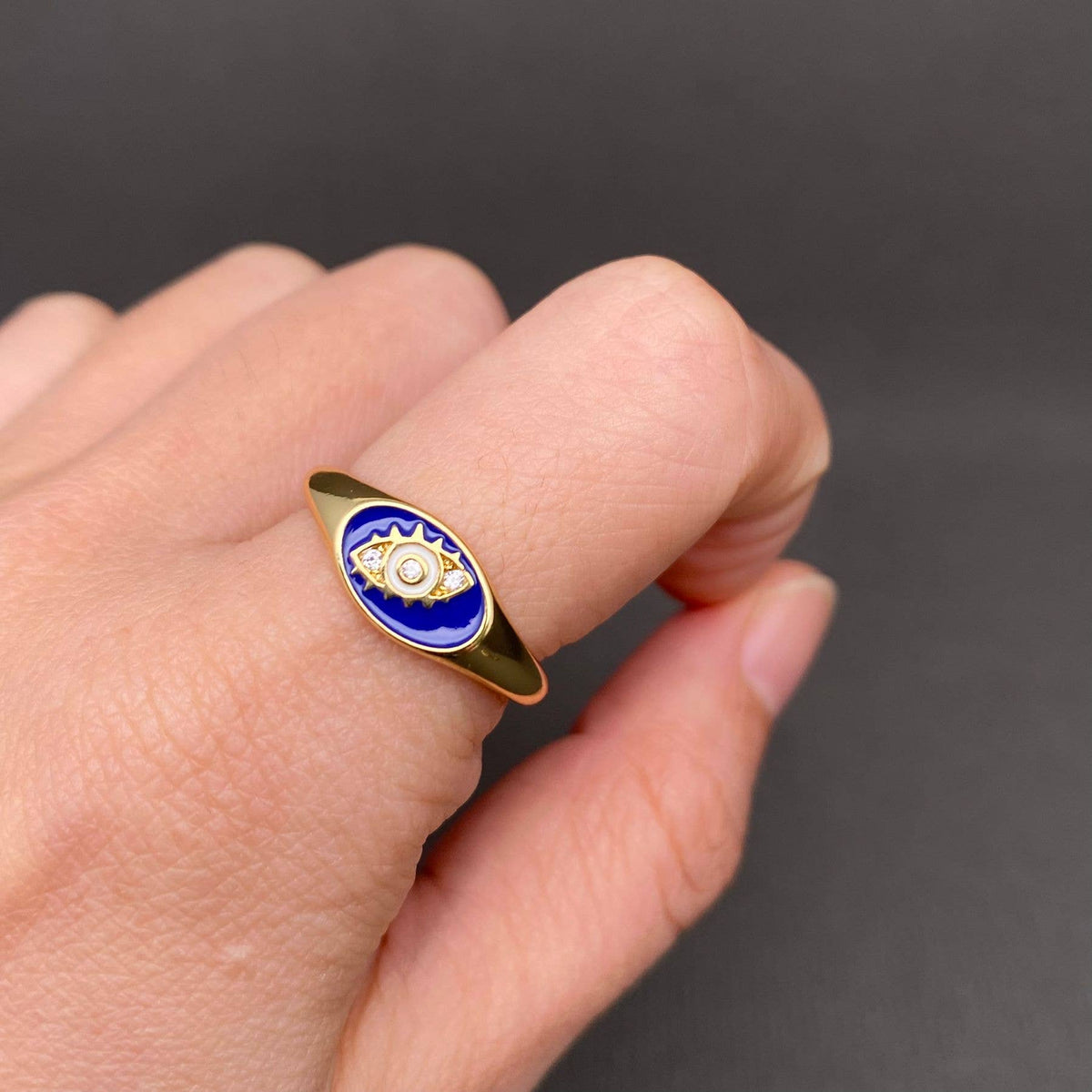 Rhinestone Inlaid Enamel Eyes Golden Ring