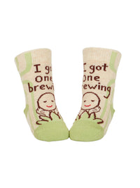 The Camera Loves Me/ I Got One Brewing Baby Socks